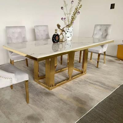 China Nueva mesa de comedor rectangular de acero inoxidable en venta