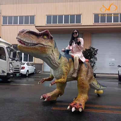 Chine Tour de voiture de dinosaure à roues par trois sur le tour électrique réaliste sur le dinosaure à vendre