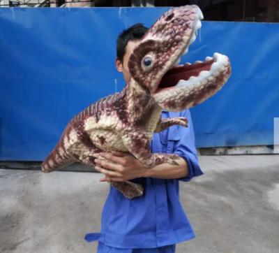 China Baby Dinosaur Puppet Hand Vivid Cute Velociraptor Hand Puppet for sale