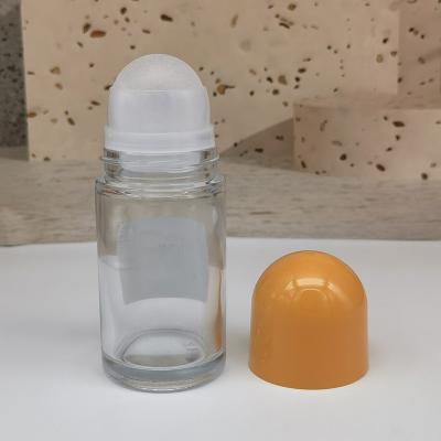 China Empty Clear Deodorant Stick Container Thick Glass Roller Ball Essential Oil Bottle 50ml for sale