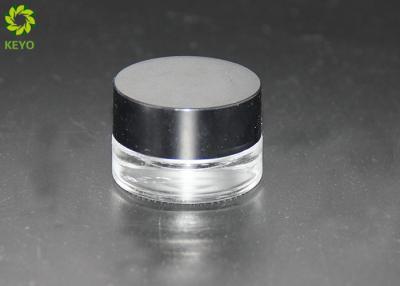 China Small Clear Glass Cosmetic Cream Jar 3ml 5ml With Black Plastic Lid for sale