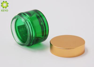 China 1 OZ Custom Cosmetic Packaging Containers Green Glass Material Made for sale