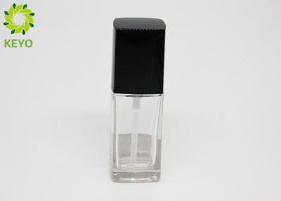 China Flat Square Empty Clear Glass Foundation Bottle With Black Square Pump for sale