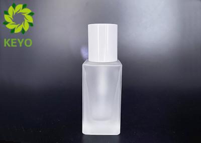 China 30ml Frosted Square Glass Foundation Bottle With White Pump And Cap for sale