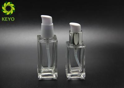 China Foundation Serum Cosmetic 30ml 50ml Clear Square Glass Bottle With Self Lock Pump for sale