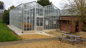 China Highly Protective Glass Greenhouse With UV Protection for sale
