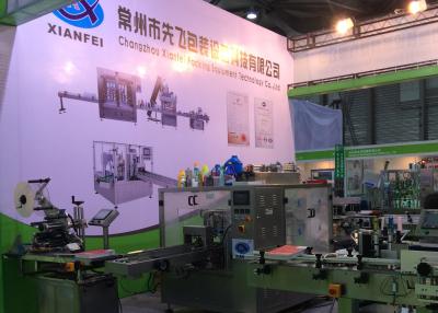 China Weighing Volumetric Piston Filling Machine SUS304 Oil Bottle Packing Machine for sale