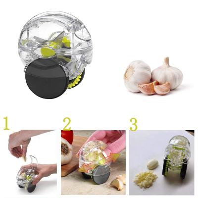 Quality Plastic Rolling Garlic Press Crusher Chopper Kitchen Gadgets 6.3*5.0*8.0 cm for sale