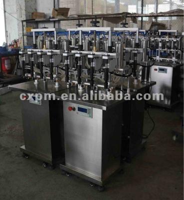 China Guangzhou CX semi-automatic alcohol bottles filling machine for sale