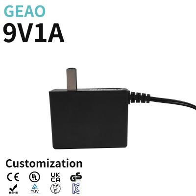 China 9V 1A Wandmontage-Stromadapter für den weltweiten Switch Lite Ps4 Laptop Digital Photo Frame zu verkaufen
