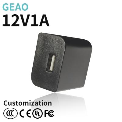 China do carregador portátil da parede de 12V 1A 15W estojo compacto universal e peso leve USB à venda