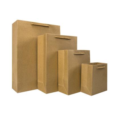 China Brown Biodegradable Bulk Craft Paper Bags , Durable Paper Shopping Bags With Handles for sale