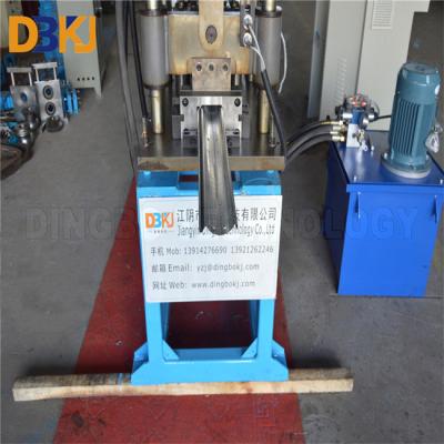 China 10 m/min Máquina de moldagem de rolos de cortina de porta Cr12 Lâmina de tratamento térmico à venda