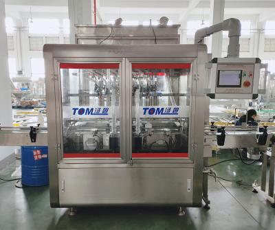 China 100 ml-1L 8 boquillas Máquina automática de embalaje químico controlada por PLC para alcohol etílico en venta