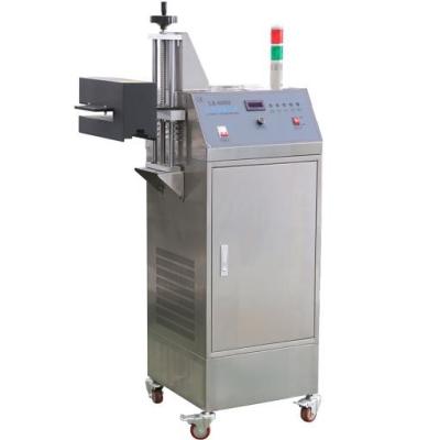China Máquina automática de embalagem química Máquina de vedação por indução de folha de alumínio a água fria à venda