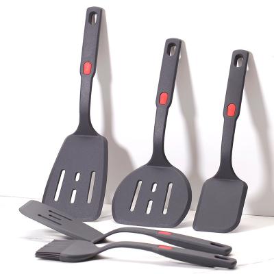 China 5pcs New Silicone Cooking Utensils Set Silicone Baking Spatula Utensils Set First Home Essentials Kitchen Gadget Set for sale