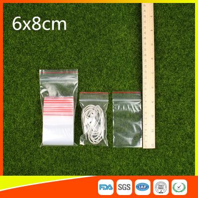 China Polythene Clear Ziplock Bags Self Press Bags Grip Seal Bag With Red Lines for sale