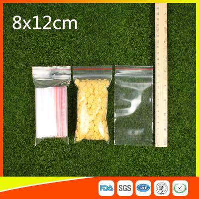 China El Ziplock reutilizable plástico del Ldpe empaqueta 8x12 cm con la línea colorida en venta