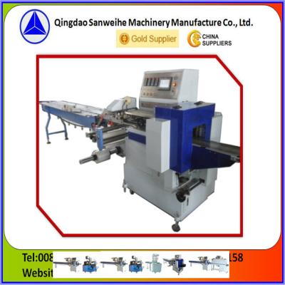 China Máquina de embalaje de flujo horizontal azul de 3,6 KW, máquina de envasado alternativo de película más ancha en venta