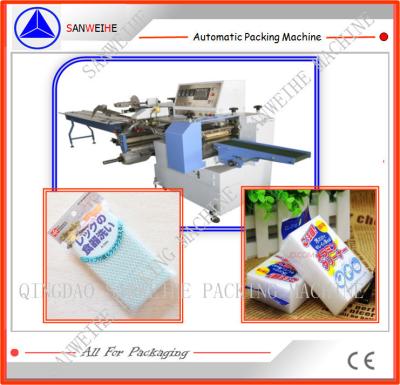 China PE Film Flow Wrapping Machine Swf 590 Horizontal Wrapping Packaging Machine for sale
