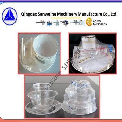 China PLC Control Automatic Shrink Packaging Machine Swd 2000 Tableware Packaging Machine for sale