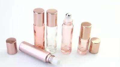 China 5ml 10ml Round Glass Essential Oil Bottle Pink Roller Roll With Aluminum Cap for sale