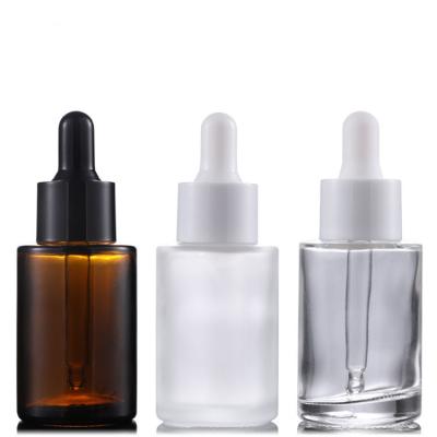 China Botella cosmética redonda 10ml 15ml 20ml del dropper del suero del cristal de botellas de aceite esencial en venta