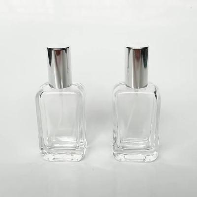 China Factory Wholesale New Empty Oil Perfume Spray Bottle Luxury 30ml 50ml 100ml Clear Square for sale