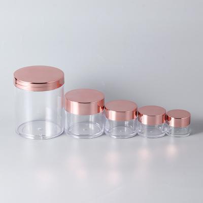 China Small 60ml 120ml 250ml Plastic Cosmetic Jars With Pink Gold Screw Lids for sale