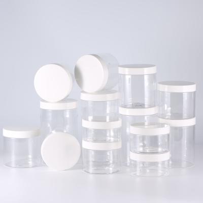 China 30ml 45ml 65ml ABS Clear Plastic Jars With Lids Mini Wide Mouth for sale