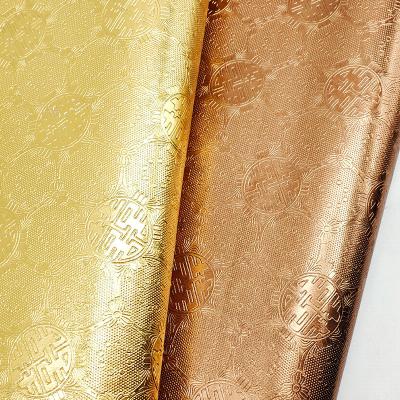China Envasado en caja de cuero de la serie dorada de cuero de PVC en relieve no tejido en venta