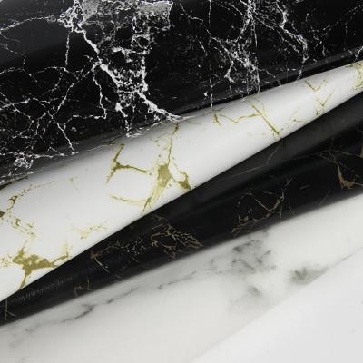 China 0.7mm impermeável PU de couro sintético Falsos padrão de mármore fosco à venda