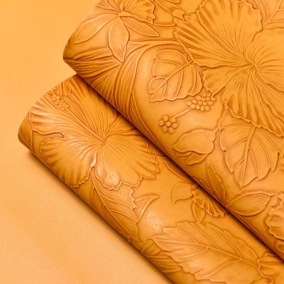 China 3D Retro Floral Embossed PVC Leather Brushed Bottom For Handbag Packaging Box Decorative Fabric Placemat Faux Leather à venda