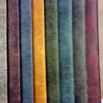 Chine Le polyester 100% d'usine de tissu a tricoté les tissus en cuir synthétiques de fourrure de Faux de suède à vendre