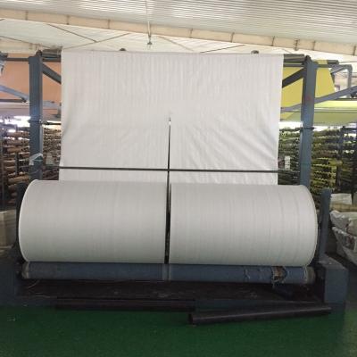 中国 白いPPによって編まれる袋は紫外線上塗を施してあるPPによって編まれる袋ロールを転がす 販売のため