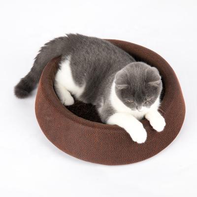 China Weigth 270g Soft Round Cat Bed Brown Color PU Leather Material Customized Logo for sale