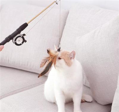 China Retractable Feather Teaser Cat Toy Plastic Material For Pet Cat Play for sale