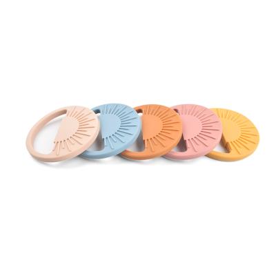 China Beige Pink Silicone Teether Ring Infants Teething Stacking Rings for sale