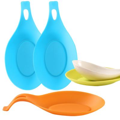 China Orange Silicone Spoon Rest Utensil Holder Sustainable Rubber Spoon Rest for sale