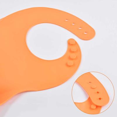 China Cute Silicone Feeding Bib For 0-3 Years Old Kids Silicone Bib With Food Catcher for sale