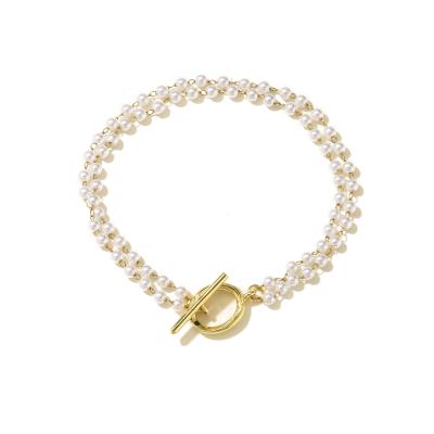 China OEM 18k Gold Bracelet Imitation Pearl OT Button Charm Bracelet for sale