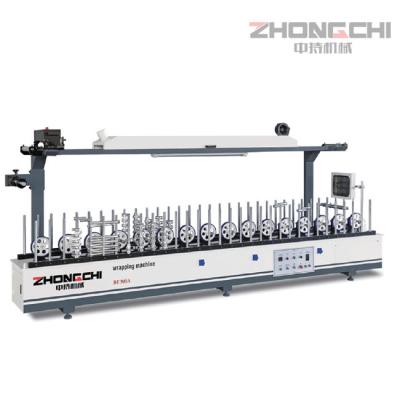 China Máquina para envolver perfiles de carpintería de 300 mm en venta