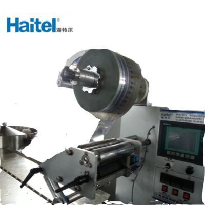 China Stainless Steel Flow Wrap Candy Packing Machine for sale
