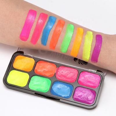 China Neon 8 Fluorescent Colors Water Based Face Body Makeup Palette UV Glow Face Paint Kits for sale