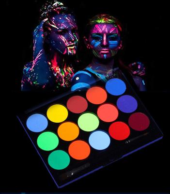 China 15 color Glow UV Artist use body paint face palette with stencils Water Activated Aqua Cosmetic Eye Liner Make Up Palette for sale