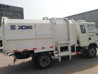 China Camión sellado del compresor de la basura 7300kg, camión de descarga aerodinámico del uno mismo en venta