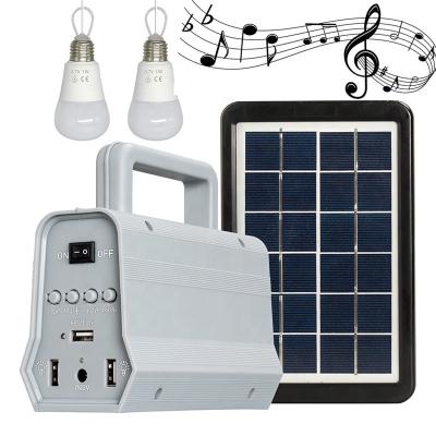 China Mini equipos portátiles del sistema de iluminación de la energía solar para el hogar con los sistemas 2 del solarenergie del altavoz de la música en 1 en venta