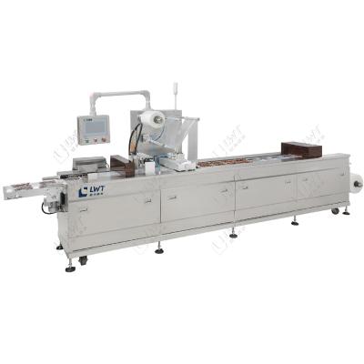 China Auto Thermoforming Vacuum Packing Machine Complete Sachet Packaging Line for sale