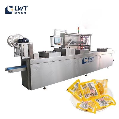 China Línea de embalaje al vacío Leadworld 320 Máquina de embalaje al vacío de huevos cocidos en venta