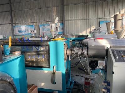 China PE Carbon Spiral Reinforcing Plastic Pipe Production Line 50mm-200mm for sale
